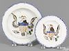 Pearlware blue feather edge cup plate and toddy plate, 19th c., with an American eagle, 4'' dia.
