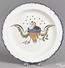 Pearlware blue feather edge plate, 19th c., with an American eagle decoration, 9 3/4'' dia.