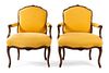 * A Pair of Louis XV Beechwood Fauteuils Height 35 1/2 inches.