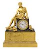 An Empire Gilt and Patinated Bronze Mantel Clock Height 16 1/4 inches.