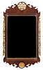 * A Chippendale Style Parcel-Gilt Mahogany Mirror Height 47 x width 25 1/2 inches