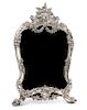 * A Russian Silver Table Mirror, Mark of Faberge, St. Petersburg, 20th century, having a floral crest above an applied double-he