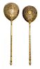* Two Russian Silver-Gilt Spoons, Various makers, Moscow, late 19th century, the underside of one bowl with niello geometric dec