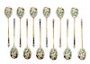 * A Set of Twelve Russian Silver and Enamel Spoons, Mark of 20th Artel, Moscow, early 20th century, each having an enameled fini