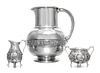 * An American Silver Pitcher, Gorham Mfg. Co., Providence, RI, 1883, having a flattened spherical body with a cylindrical neck,