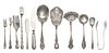 * A Group of American Silver Flatware, Various Makers, comprising a sauce ladle, a flat pierced server, cocktail forks and other