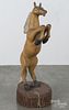 Carved and painted figure of a rearing horse, 20th c., 42'' h.