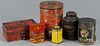 Six painted tins, to include a red example fitted with six interior spice canisters