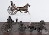 Cast iron horse drawn fire pumper, 19th c., 15'' l., together with a cast iron horse drawn cart, 8'' l