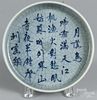 Chinese celadon shallow bowl with underglaze script decoration, 2 1/4'' h., 9'' dia.
