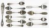 Coin silver spoons, by Dubois, Shoemaker, Lownes, etc., together with a Bevan butter knife, 5.8 ozt.