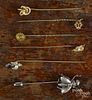 Six stick pins, to include a Gorham sterling silver fly pin, a yellow gold knot pin with an opal
