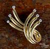 Dankner 14K yellow gold brooch with six diamond terminations, approx. .05ct each, 7.7 dwt.