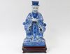 BLUE AND WHITE PORCELAIN FIGURE OF AN EMPEROR