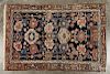 Two Persian throw rugs, early 20th c., 4'9'' x 3'2'' and 2'3'' x 6'4''.
