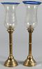 Pair of European brass candlesticks with etched glass shades, 23 1/4'' h.