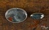 Two moss agate brooches, one with an 800 silver frame, 1 3/4'' l. and 1'' l.