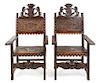 * A Pair of Italian Baroque Style Carved Walnut Armchairs Height 54 inches.