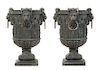* A Pair of Gothic Style Patinated Cast Iron Urns Height 33 inches.