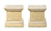 * A Pair of Cast Stone Pedestals Height 20 inches.