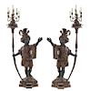 * A Pair of Venetian Baroque Style Cast Metal Figural Torcheres Height 72 inches.