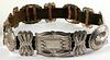 A HANDSOME NAVAJO BELT WITH FOURTEEN SILVER CONCHOS