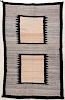 A GOOD C. 1940 NAVAJO RUG WITH TWO FLOATING WINDOWS