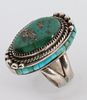 AN UNUSUAL LES BAKER WORKSHOP TURQUOISE NAVAJO RING