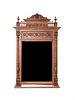 A French Chestnut Brittany Style Mirror Height 51 1/2 x width 30 inches.