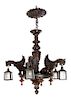 A Neoclassical Carved Oak Five-Light Chandelier Diameter 35 inches.