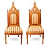 A Pair of Gothic Revival Walnut Side Chairs Height 50 1/2 inches.