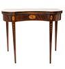 A Hepplewhite Style Mahogany Flip-Top Game Table Height 30 x width 36 x depth 18 1/2 inches.