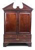 A Chippendale Style Mahogany Linen Press Height 82 x width 54 1/2 x depth 27 1/2 inches.