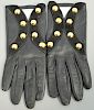 Hermes woman's black leather gloves.