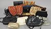 Large group of vintage purses to include two beaded purses, nine snakeskin purses, one alligator black leather, and three small gold purses.