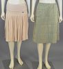 Chanel two piece skirt lot with peach pleated knit skirt and olive green A-line skirt.