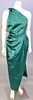 Christian Dior, Autumn/Winter 1979, Evening dress of dark emerald green silk satin. The skirt is wrapped across the front and pleated up into the wais