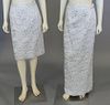Two custom silver matelasse designer skirts (lg. 42" to 24").