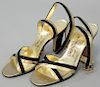 Salvatore Ferragamo black and gold womens pumps / heels / shoes in excellent condition. size 6B