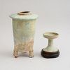 TANG IRIDESCENT PALE GREEN GLAZED POTTERY TRIPOD FUNERARY VESSEL AND A TANG POTTERY STEMMED CUP