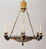EMPIRE STYLE PATINATED AND PARCEL-GILT METAL SIX-LIGHT CHANDELIER