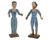 A pair of santos figures