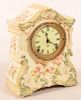 Ansonia floral painted porcelain mantle clock with 8- day movement.