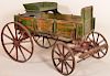 Wooden pony wagon stenciled "Ozark Farm Wagon"