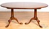 Mahogany extension dining table, with three leaves