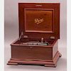 A Mira Mahogany 12 inch Disc Music Box with Forty-One Discs, 20th Century,