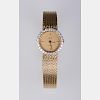 An Austin Quartz 14kt. Yellow Gold and Diamond Ladies Wrist Watch,