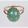 An 18kt. Yellow Gold and Turquoise Ring,