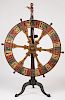 Will & Finck Gambling Wheel. San Francisco, 818 Market St., ca. 1900. The only known example, original polychrome-painted, walnut wall-mounted saloon 