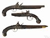 Three North African flintlock pistols, to include two single barrels with wire inlaid stocks